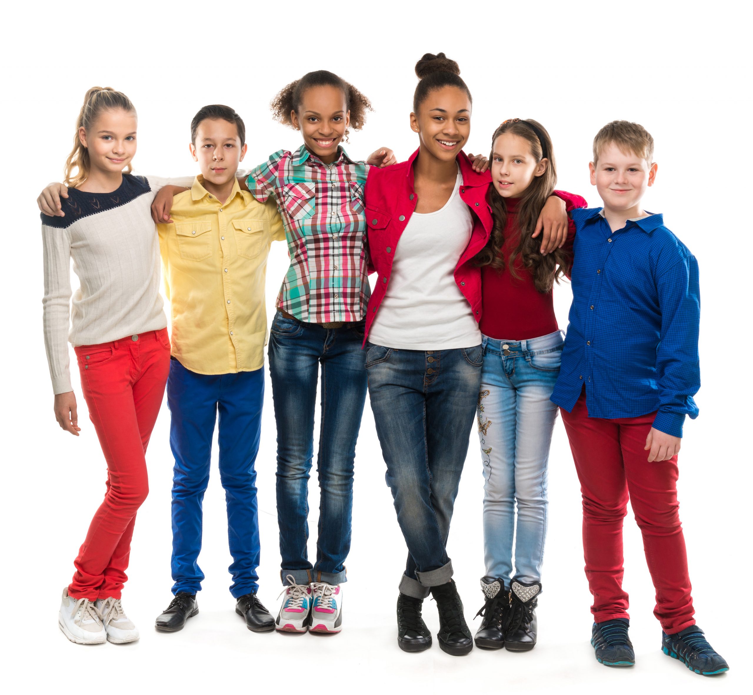 a group of children with different complexion embracing isolated on white background